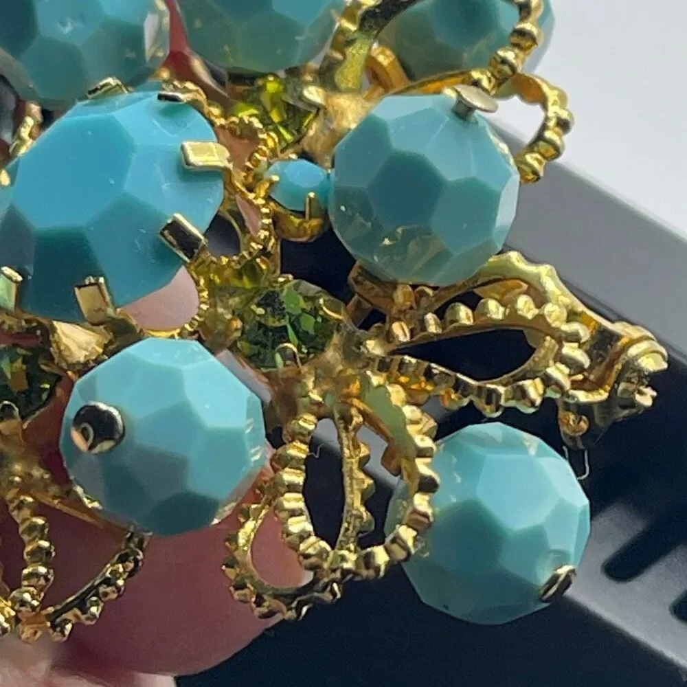 Vintage Made in Austria light blue green AB beads.